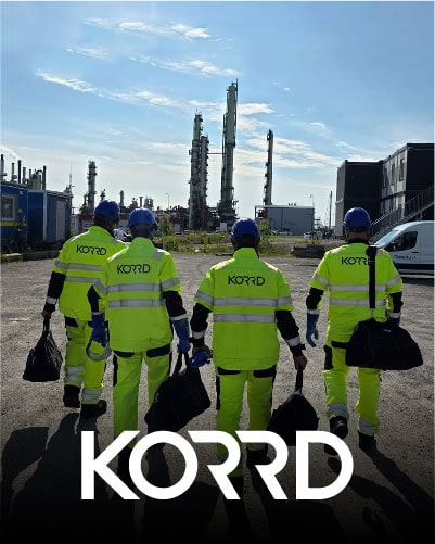 KORRD brand name on the back of employee coveralls